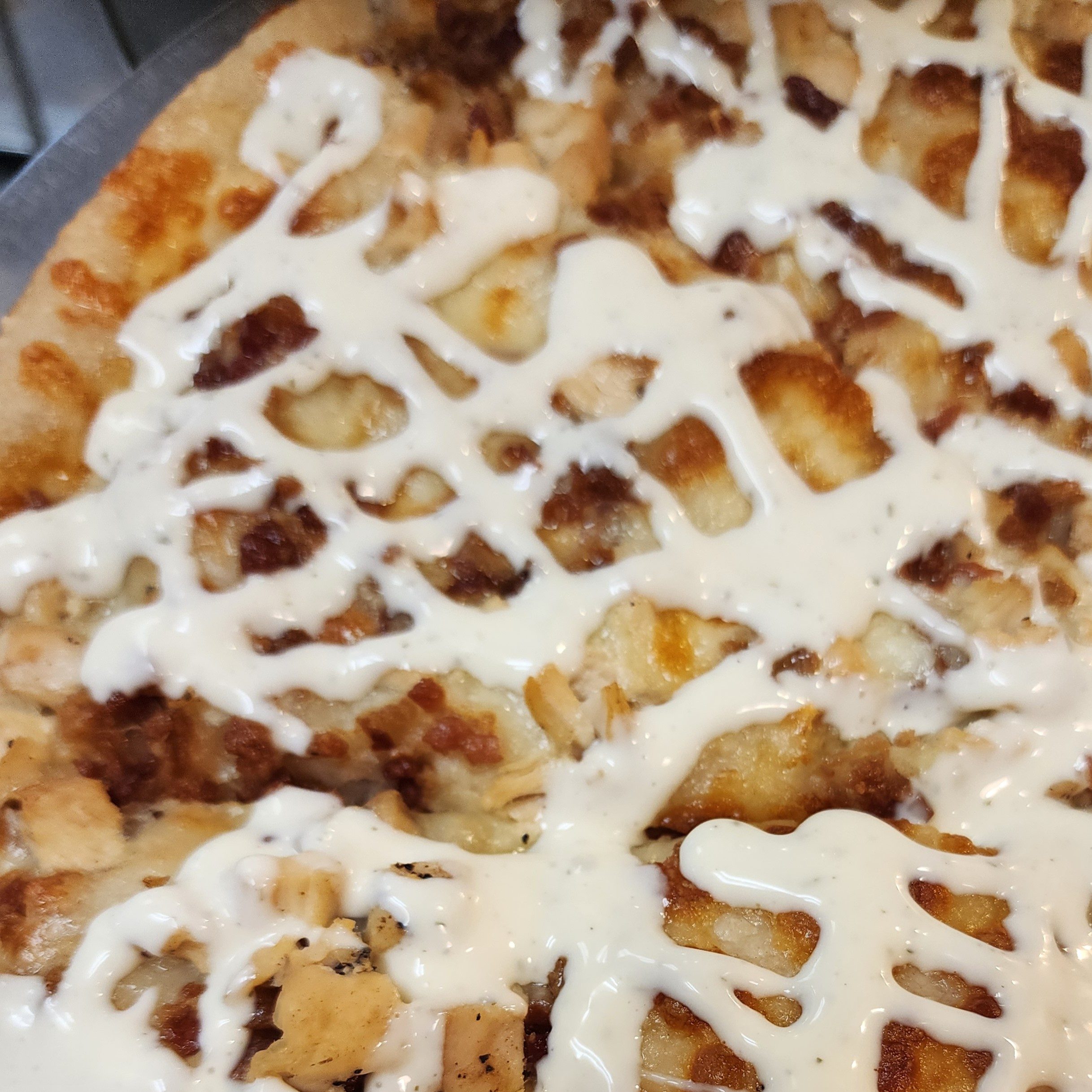 Chicken, Bacon, Ranch Pizza.