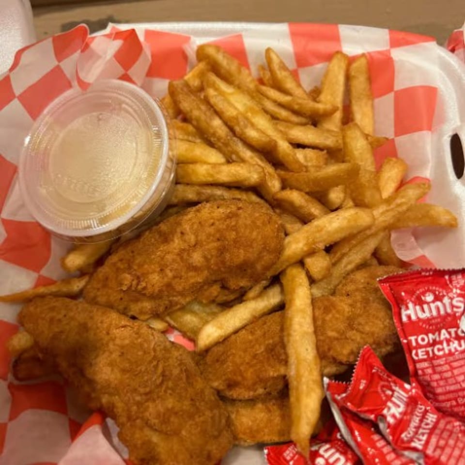 Kids Chicken Fingers with French Fries.